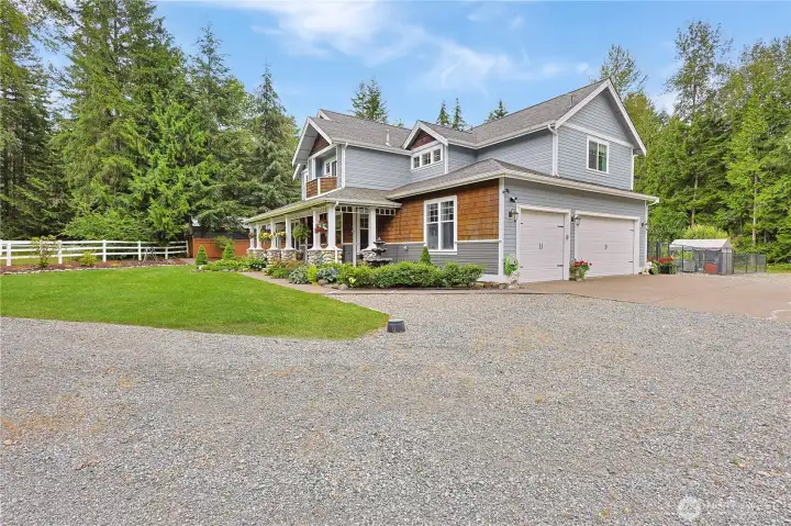 Three car garage and circle driveway. A stunning entrance to match the home.