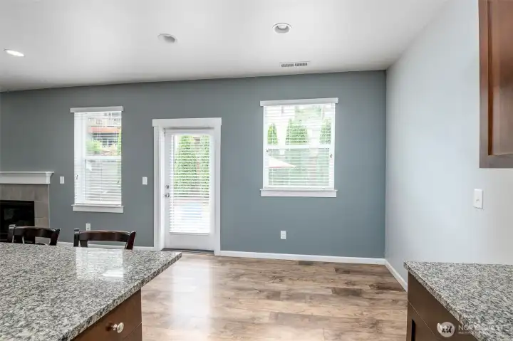 Kitchen nook with door to rear yard for easy entertaining both inside and out. Kitchen nook with door to rear yard for easy entertaining both inside and out.