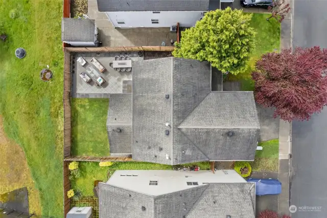 A great aerial view of the property, 600 sq ft patio and that there is no homes directly behind you.