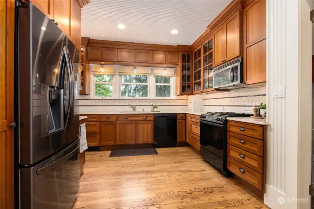 Remodeled kitchen with upgraded appliances and plenty of cabinetry