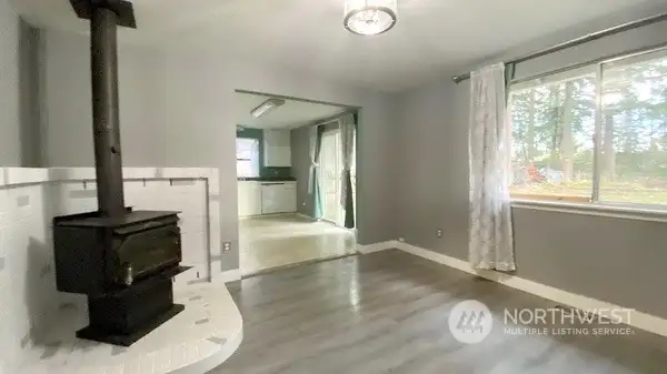 Looking through dining room to the kitchen