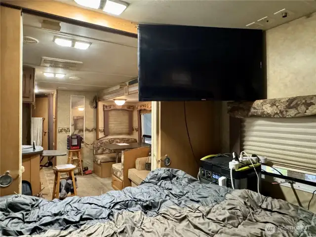 Mounted TV in sleeping room.