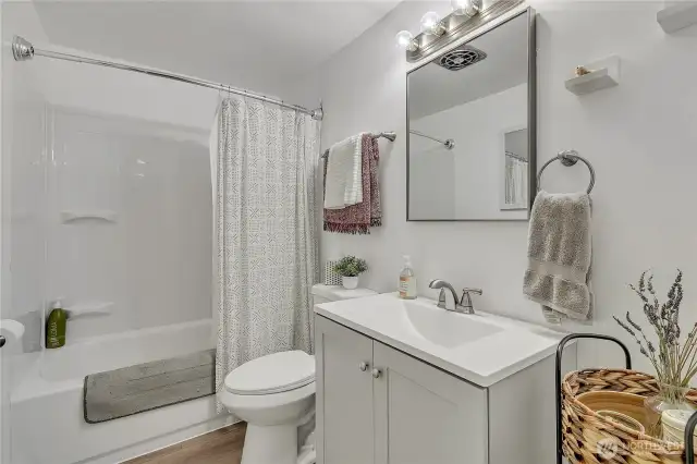 Recently updated full bathroom in the hallway.