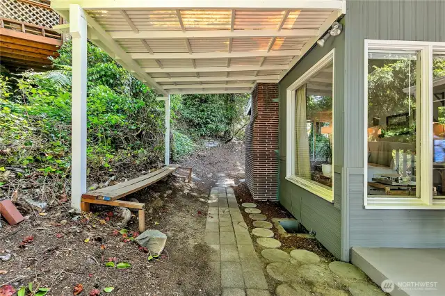 Cover off the side of the house provides a great location for firewood or other outdoor storage.