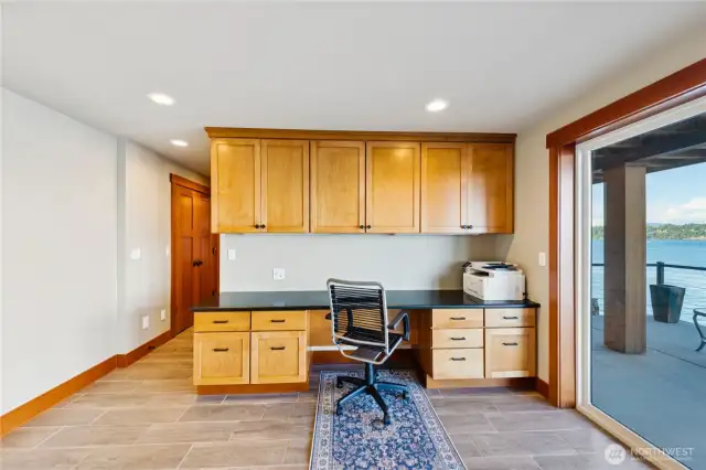 Built-in desk space on lower level is perfect for home office space. Enjoy views of the waterfront while you work.