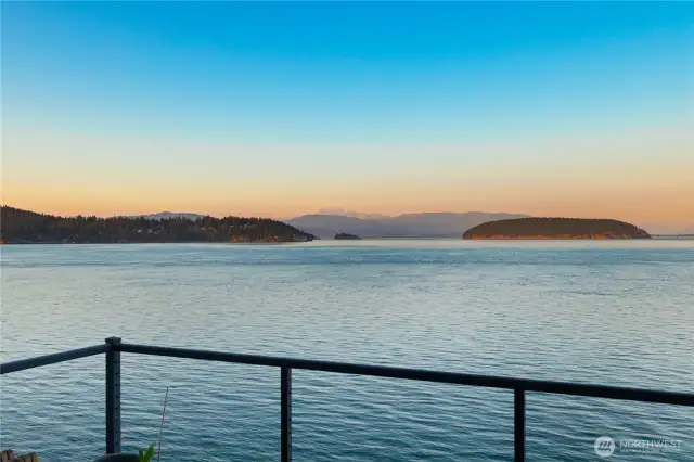 Sunset views from the deck feel like you are perched on top of the water.