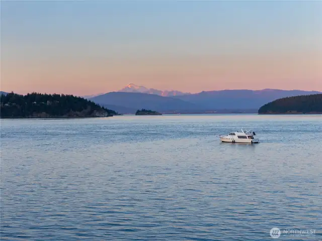 Sunset views of Mount Baker beyond the sparkling Salish Seas.
