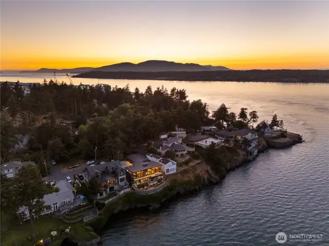 Sunset image shows the home positioned just above the water. Located on Cap Sante, a desirable neighborhood just a short distance to all downtown Anacortes Amenities including shopping, dining and theatre.