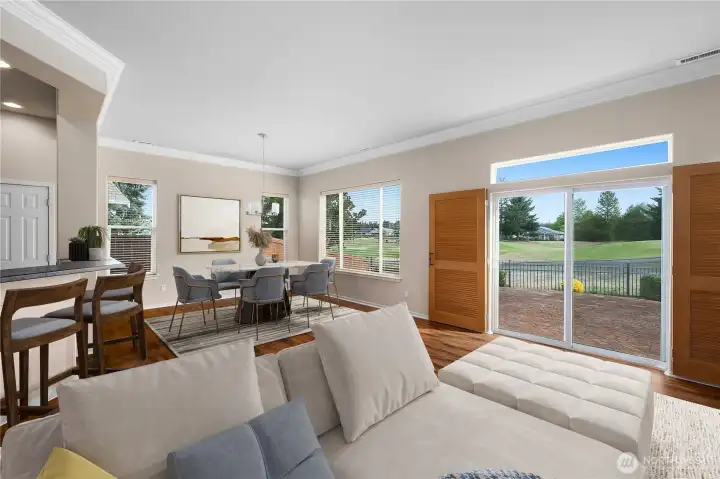 Large Great Room with engineered hardwood floors and gas fireplace.