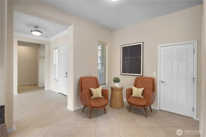 Flex sitting/dining space off kitchen that leads into laundry room.