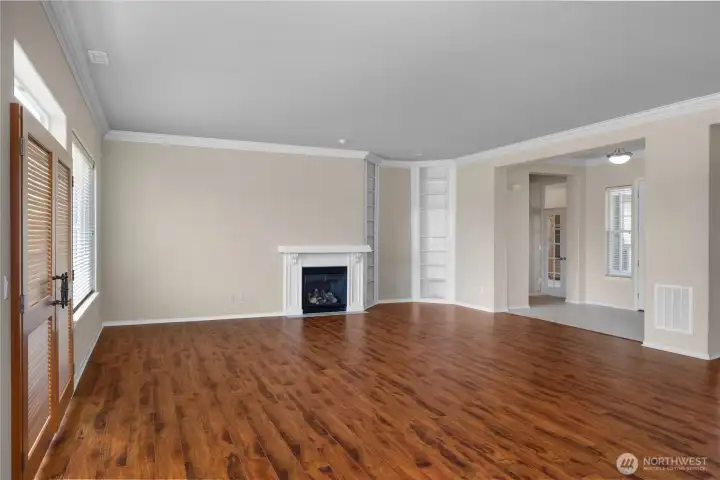 Large Great Room with engineered hardwood floors and gas fireplace.