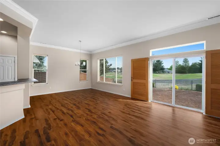 Large Great Room with engineered hardwood floors and gas fireplace.