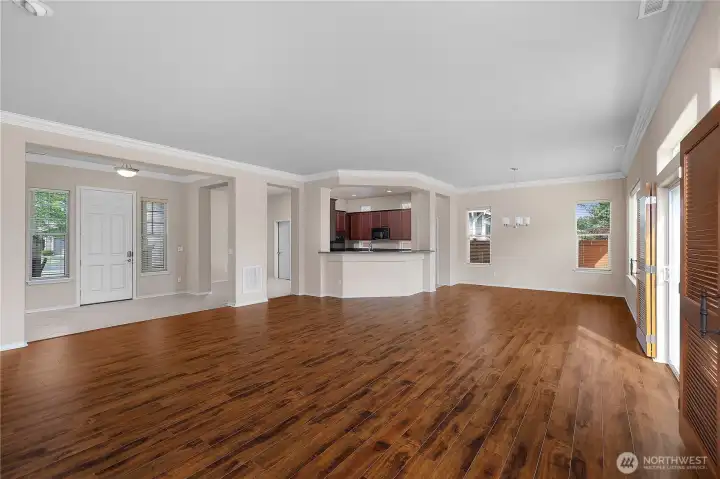 Large Great Room with engineered hardwood floors and gas fireplace.