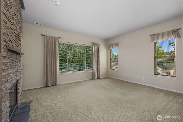 Primary bedroom and bathroom with gas fireplace, large closet and full tile shower.