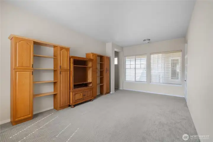 Bright and light bonus room that leads to 2nd bedroom, flex room, and full bathroom.