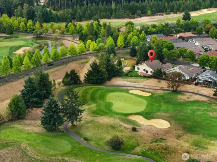 Very PRIVATE corner lot on the 7th Fairway in Jubilee 55+ community.