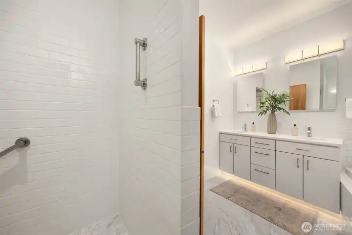Tile walk-in shower.