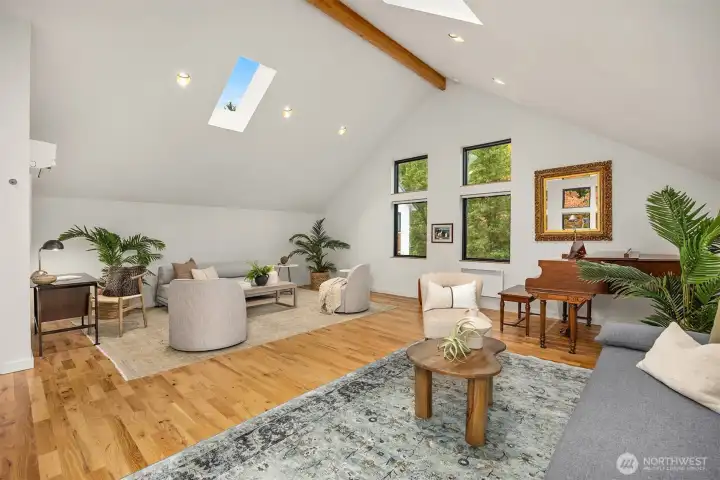 672 square foot guest studio/flex space with heating/cooling, vaulted ceiling and skylights.