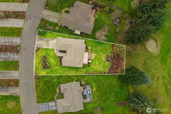 Aerial with approximate lot lines showing property boundaries.