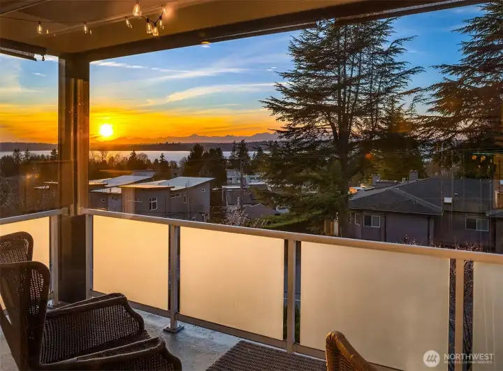 Absolutely stunning sunset views from both the balcony and interior of this lovely Houghton condo