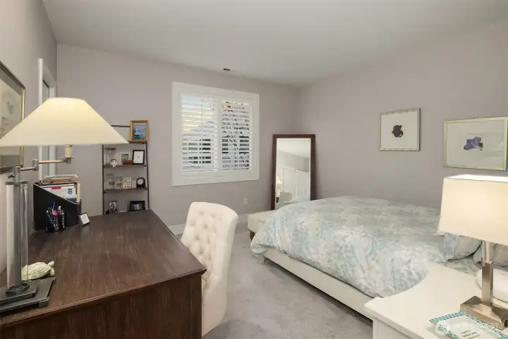 A spacious second bedroom with its own walk-in closet