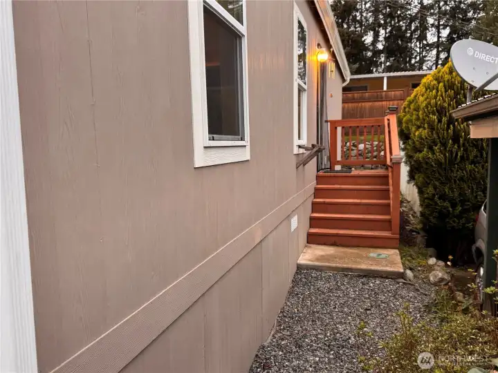 Convenient rear entry with steps and landing.