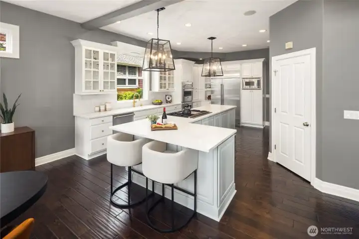 Quartz countertops, lots of cabinets, SS appliances