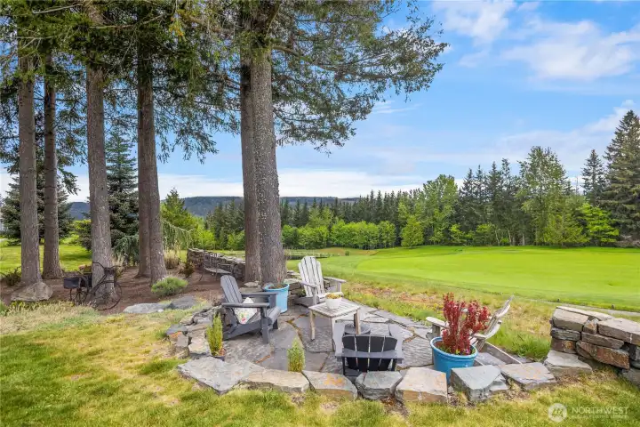 Huge Primary Suite with vaulted ceilings overlooking the golf course