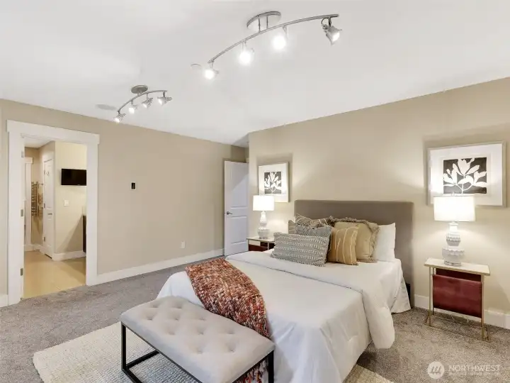 Spacious primary suite with room to unwind and recharge