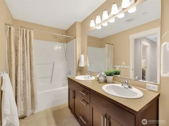 Double sink guest bath is perfect for everyday use or special guests