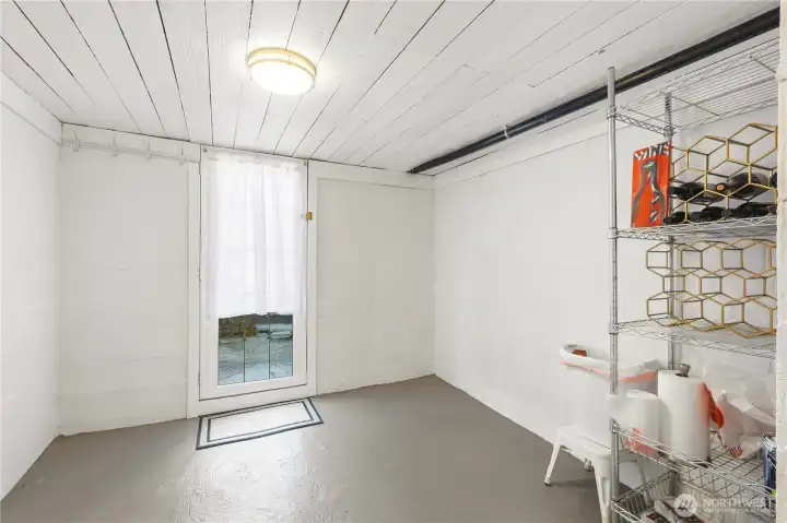 Exterior door leads to side yard.