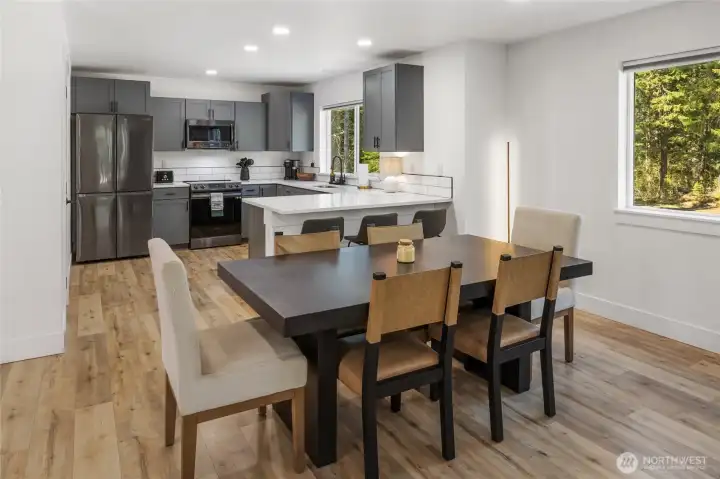 Perfect dining room location in this floor plan, with large windows surrounding for a lot of natural light.