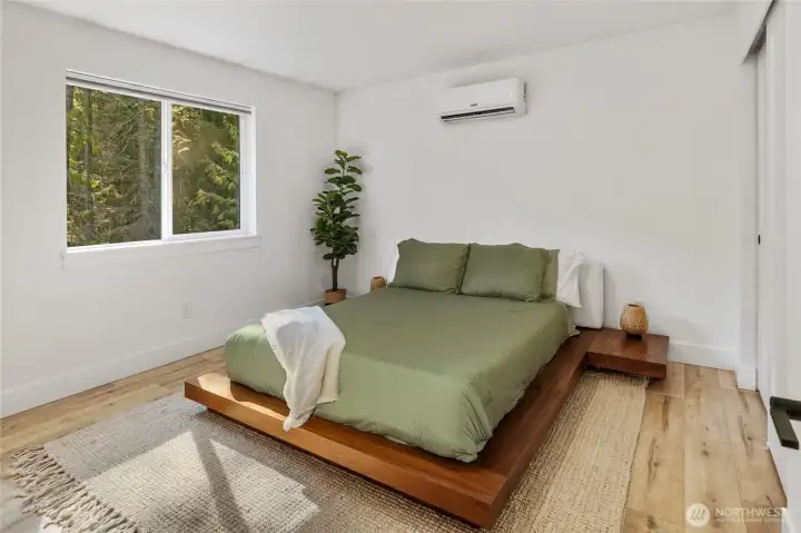Bedroom #1 has it's own mini split, beautiful floors and large windows.