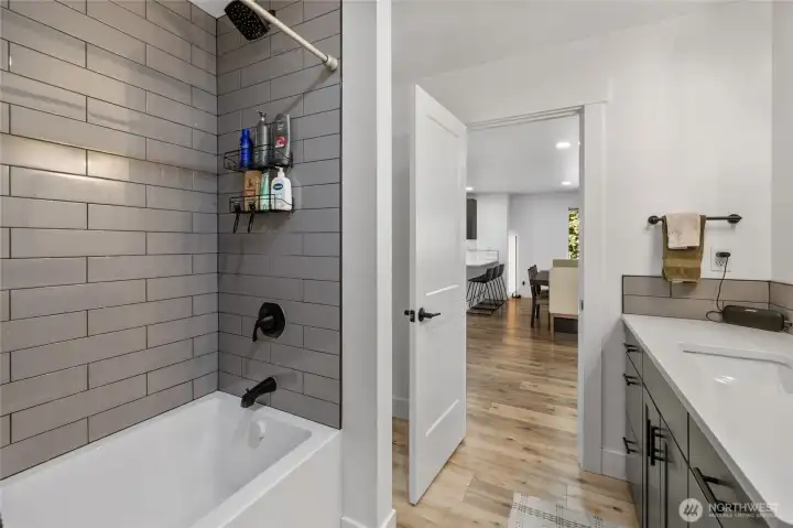 Custom tile installation and rain shower, shower head makes this feel like you are at your favorite spa!