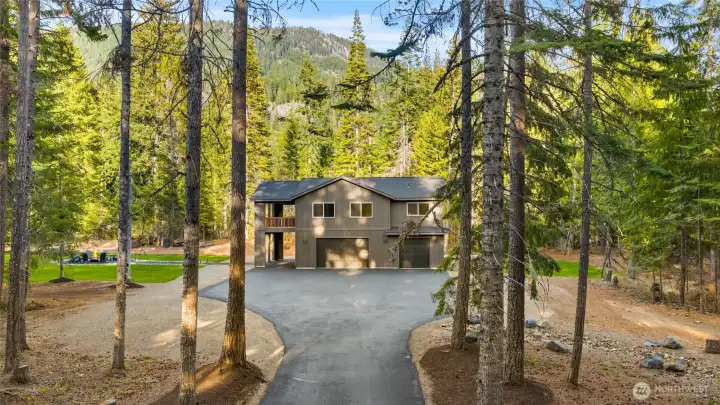 You can see it is a well maintained home and yard, completely ready to move it. Take a few laps on your own personal track, or hike the trails that are right behind your home. No need to trailer anywhere. Everything is available just outside your front door!