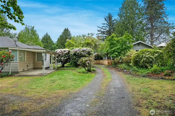 Smaller home on the left, main home on the right.