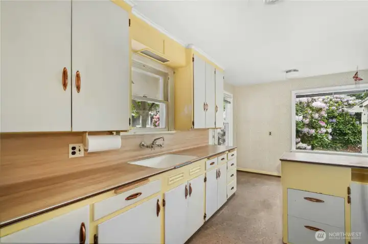 lots of cabinets, countertop space and lots of windows for natural light.
