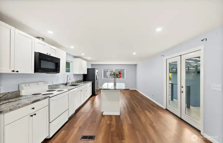 Updated Kitchen and Dining room with an Island, LVP flooring Updated Kitchen and Dining room with an Island, LVP flooring