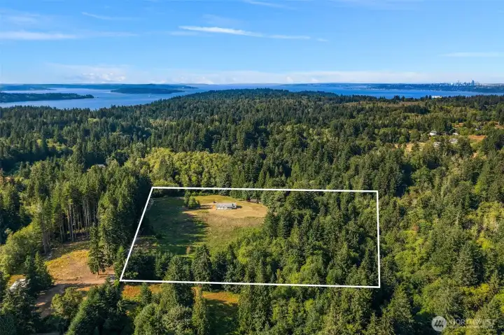 Looking directly north from south clearly shows the mixed meadow and forest. Great location near Vashon town with easy access to ferries to Seattle and Kitsap Peninsula for fun getaways.