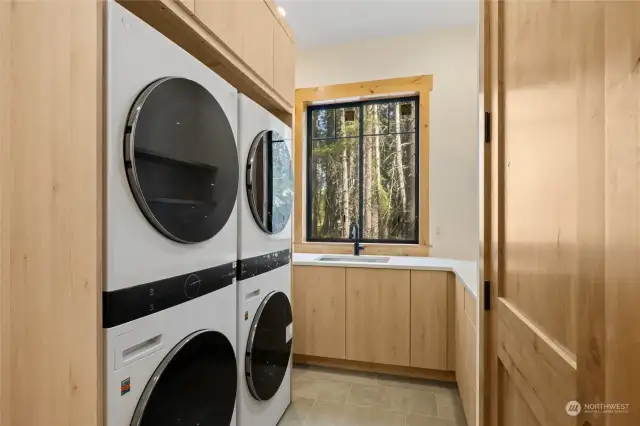 Laundry with dual washer/dryer.