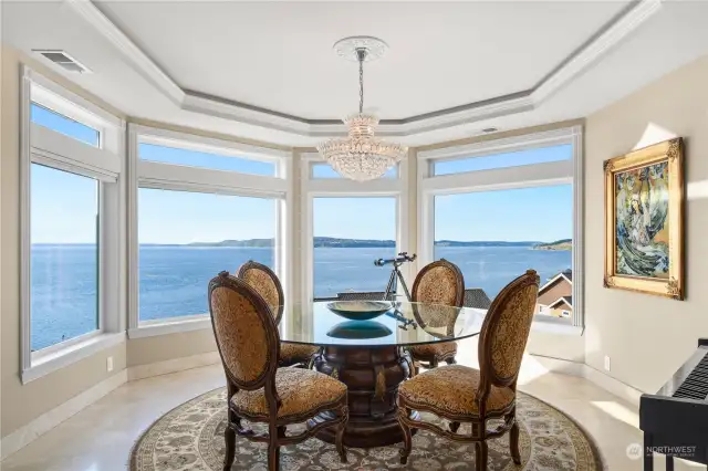 Who wouldn’t want to dine here with views, rounded elegant room, sparkling chandelier!