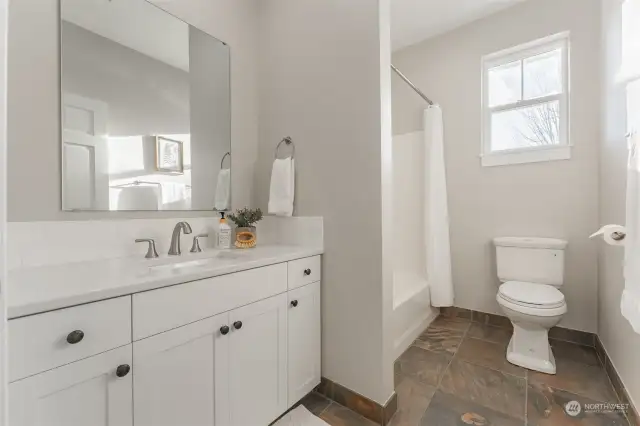 Hallway full bath near second bedroom