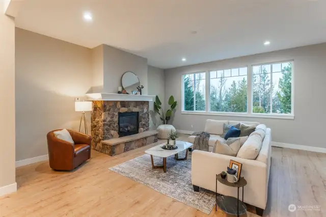 Cozy up to the gas fireplace in the living room.