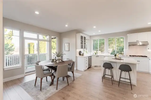 Open concept kitchen to dining and living space.