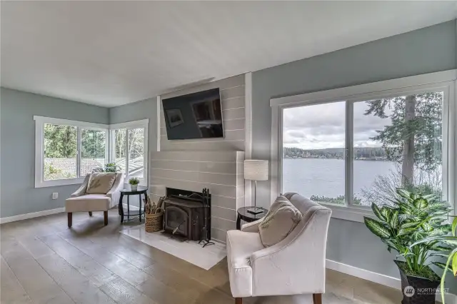 Living room with beautiful views out of all the windows.