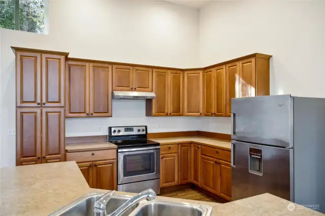 Roomy kitchen. Microwave in the cupboard.