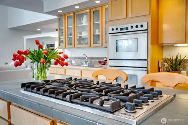 A six burner Viking cooktop, double oven and sub-zero are some of the appliances in the gourmet kitchen.