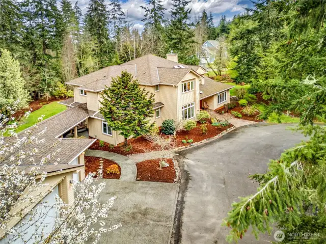 Fabulous approach into this beautiful property. The home boasts luscious lawn, mature landscaping and tons of garden space for vegetables or flowers. The home and garage are connected via covered breezeway.