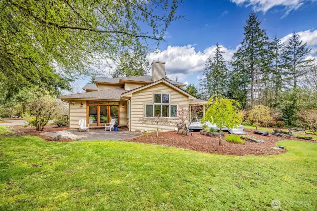Off the Lounge/Music room, there is a private stamped concrete patio.