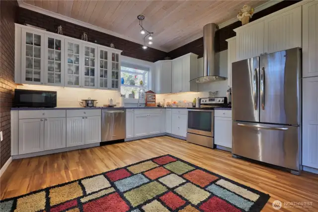 beautiful open kitchen with high end appliances